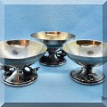 S26. Sterling silver footed dishes with bird and leaf decorations. 